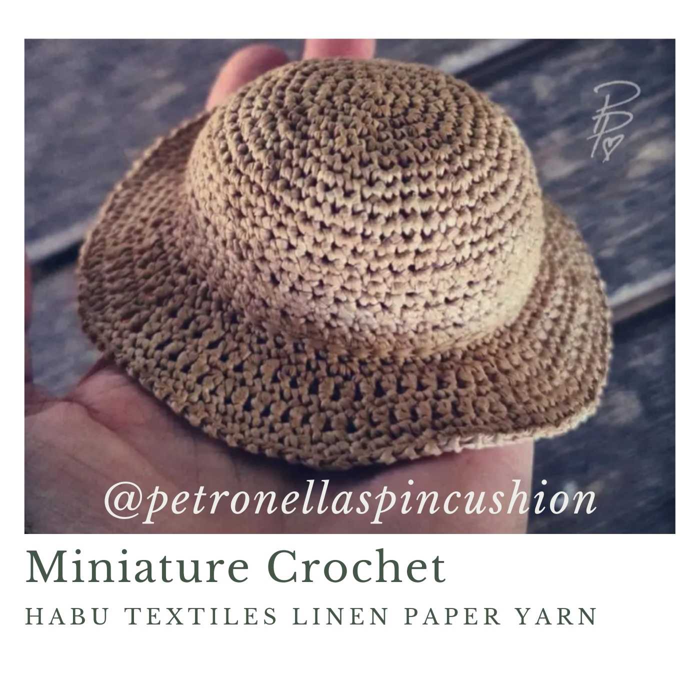 Tiny doll's hat crocheted with Habu Textiles Linen Paper Yarn in cream. Another fabulous creation of @petronellaspincushion
