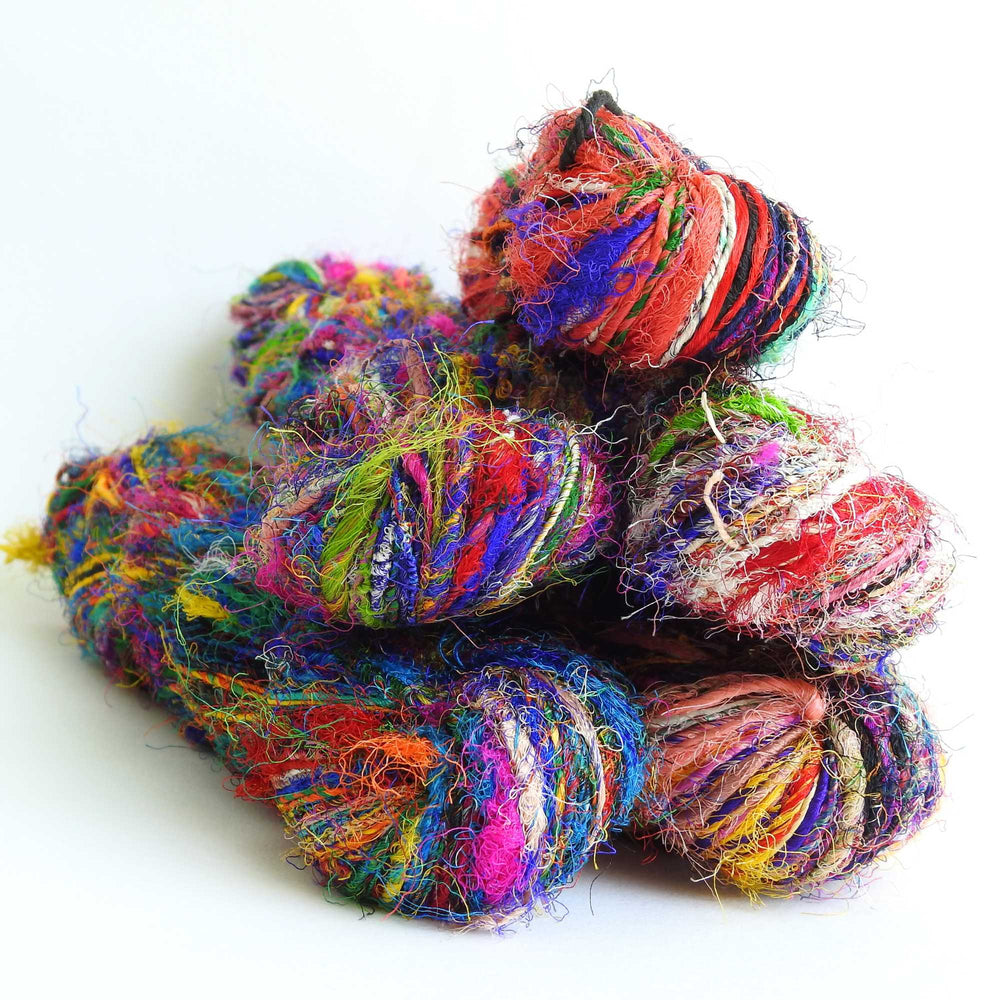 Ball of Sari Silk Yarn in Spark. Recycled sari silk yarn Australia. Eco friendly yarn. Handspun, chunky yarn for knitting, crochet, weaving, craft.