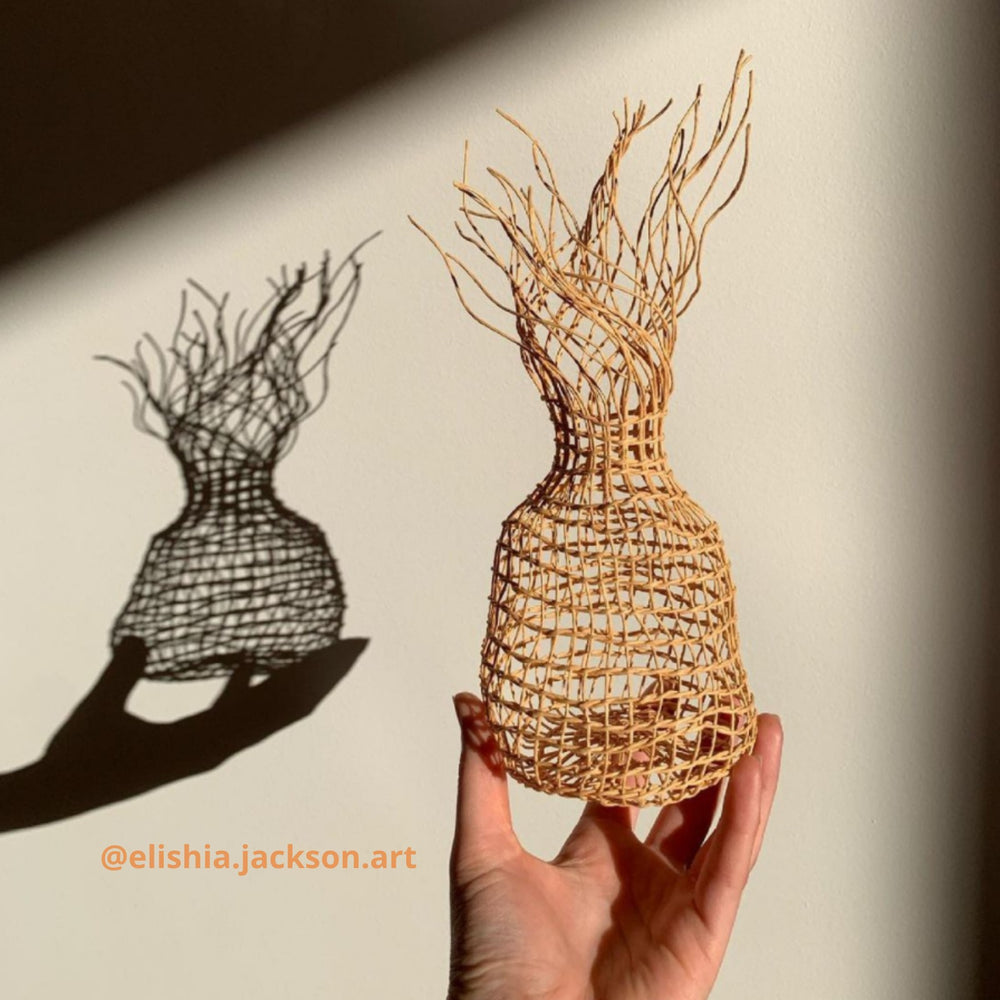 Organic shaped sculptural basket woven by elishia.jackson.art using ORA Fabulous Fibres Twisted Paper Cord