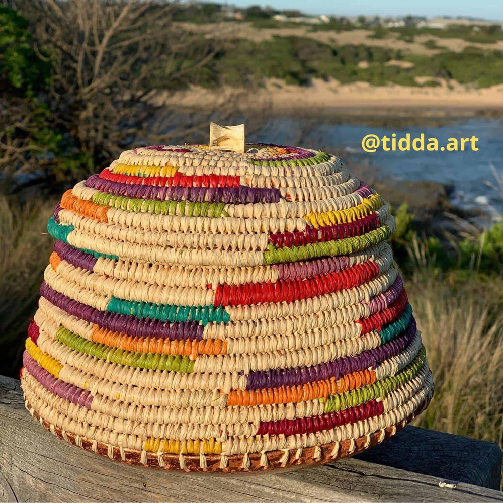 Raffia basket with lid crafted in Natural and Coloured raffia by @tidda.art