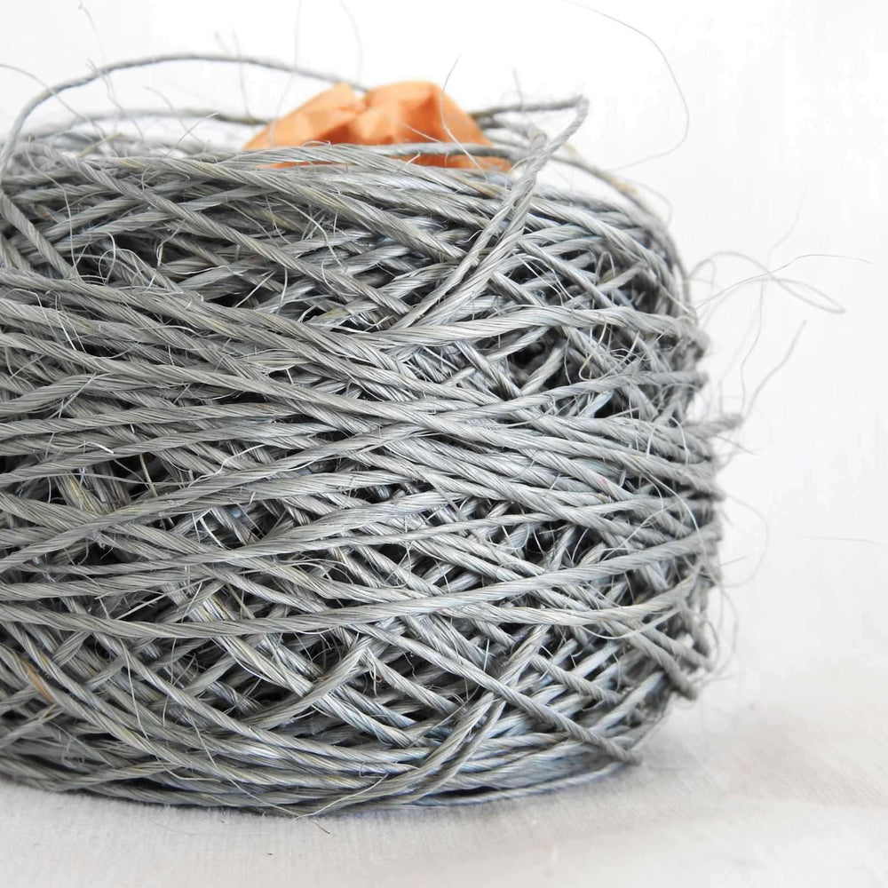 Ball of Habu Textiles Pineapple Fique in Gray. Pineapple Fique for craft, crochet, baskets, bags, weaving, hats.