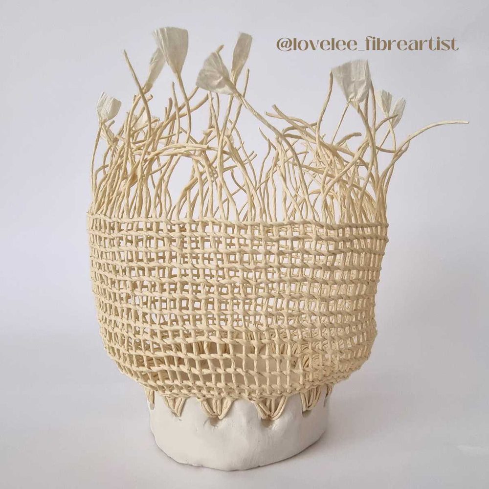 organic vessel with ceramic base and upper of twined natural paper string in cream. crafted by @lovelee_fibreartist