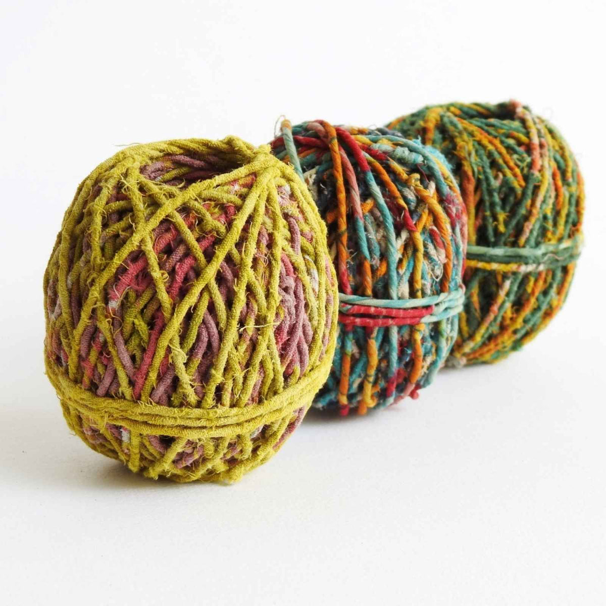 selection of yarns and twines crafted from repurposed textile waste including silk, cotton and wool