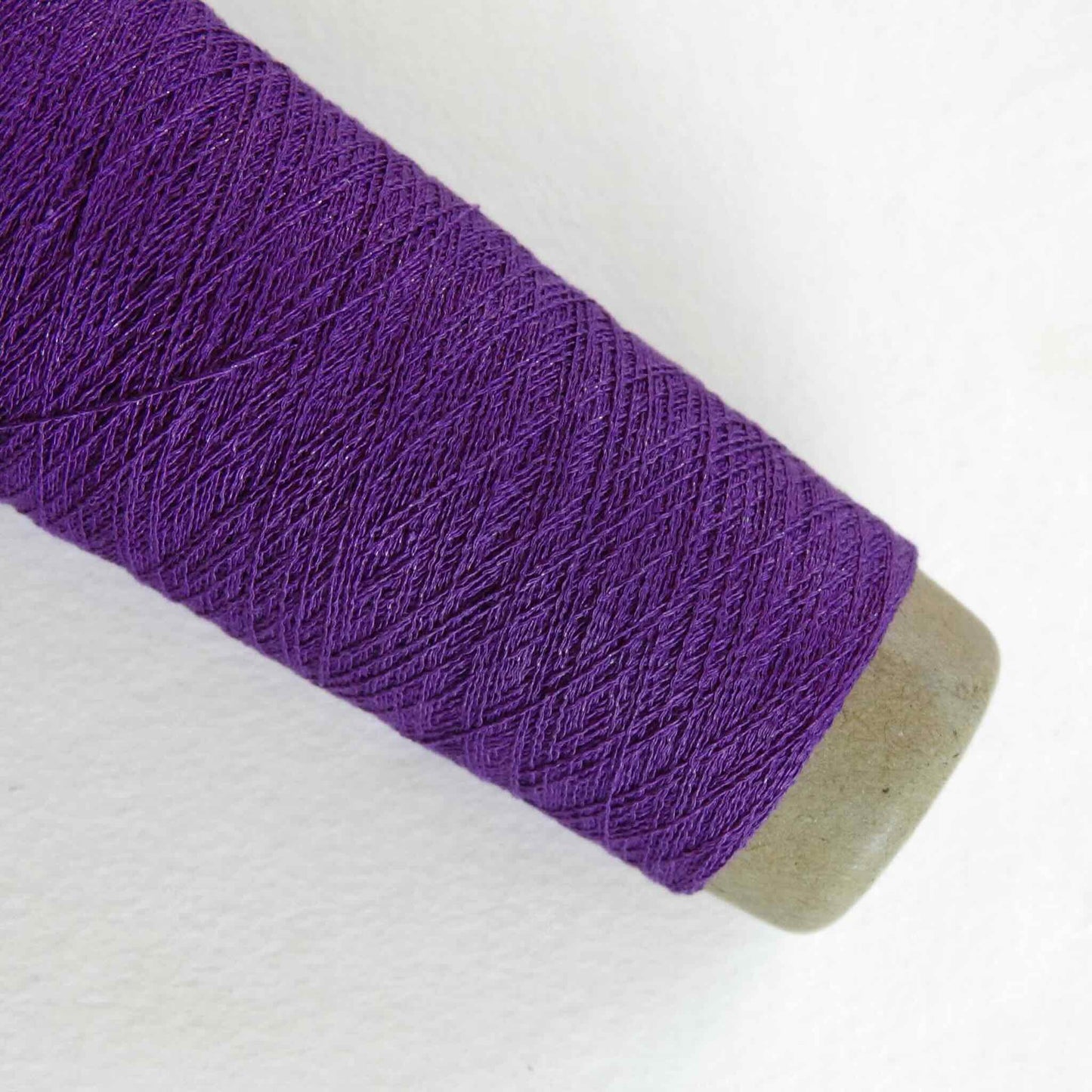 Spool of Purple Stainless Steel Silk Yarn shows the sheen and lustre.
