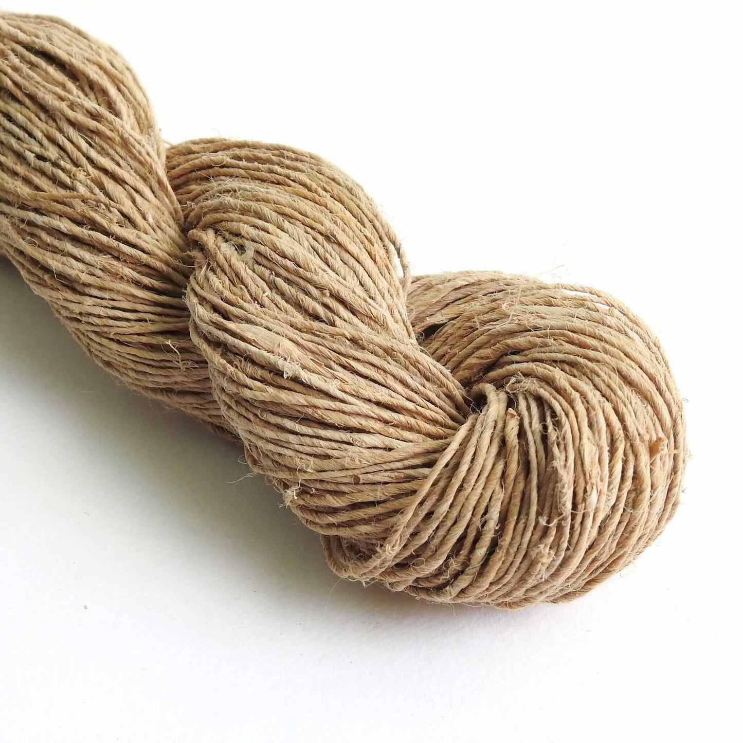 A skein of fine eco-friendly Hemp Yarn, suitable for weaving, crochet, and craft.