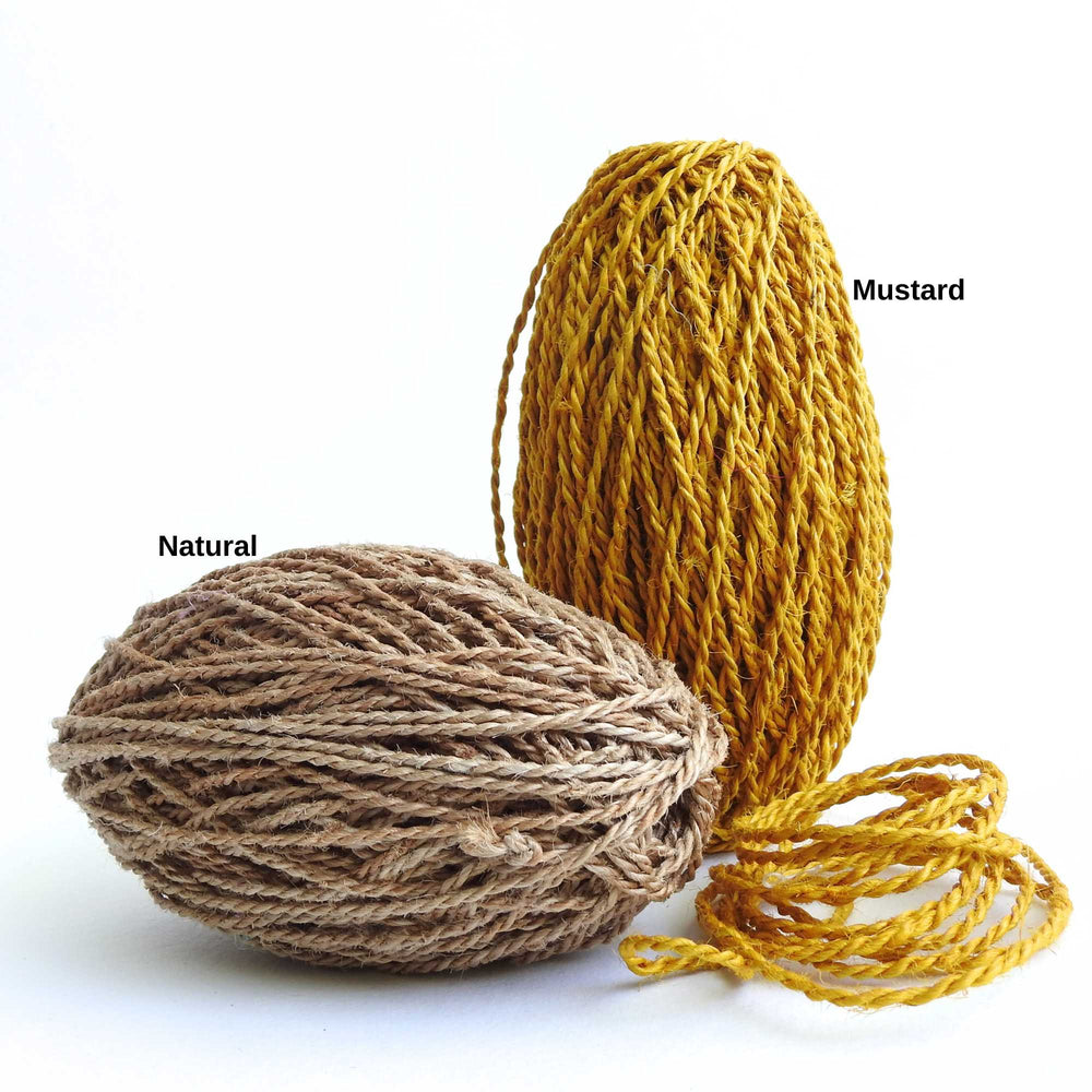 balls of braided jute cord in colours. strong with a smooth surface making it ideal for jewellery, macrame, bags, gift wrapping etc. fair trade hand crafted in bangladesh