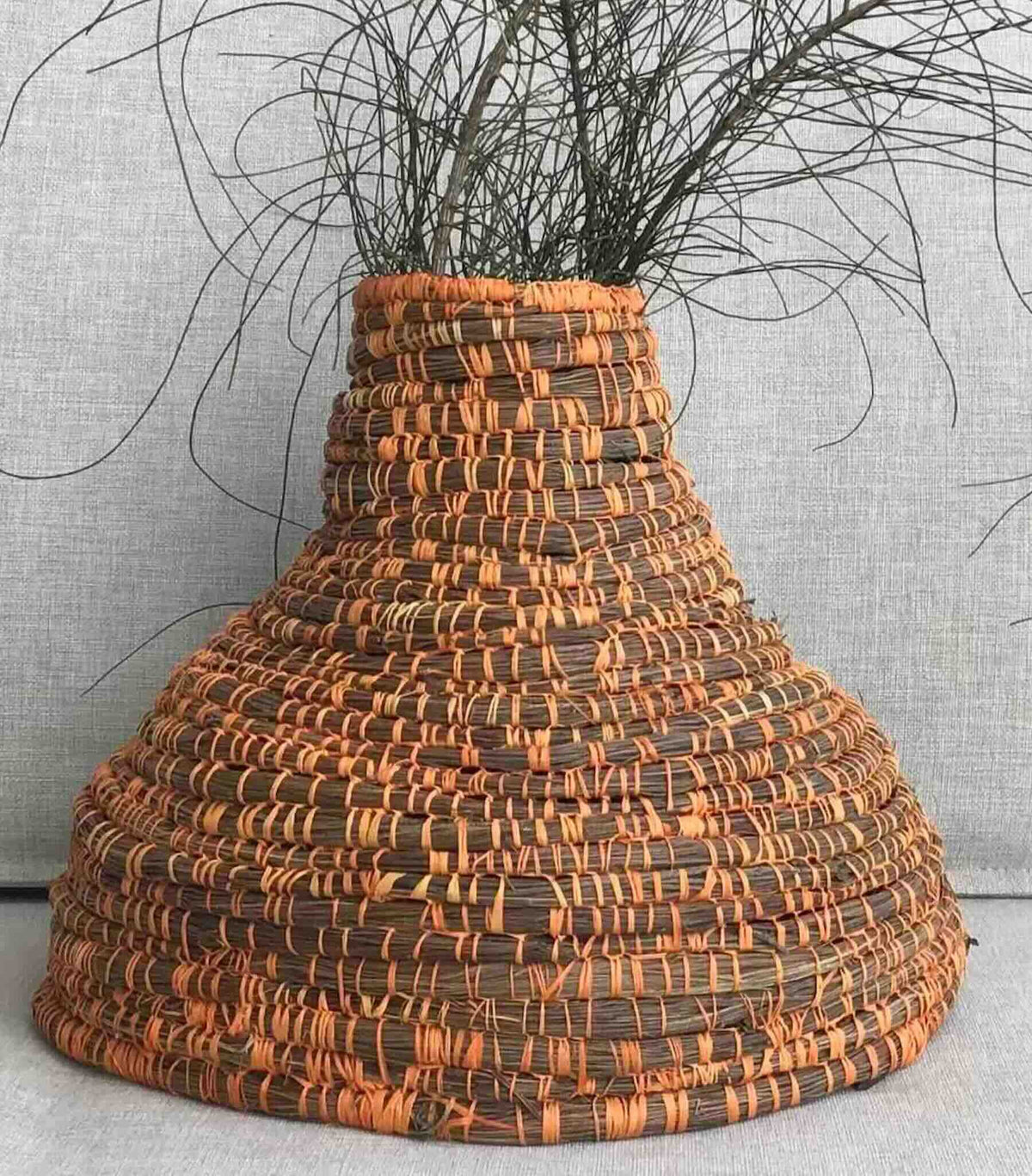 Woven basket by Louise Nade Using Ora Raffia