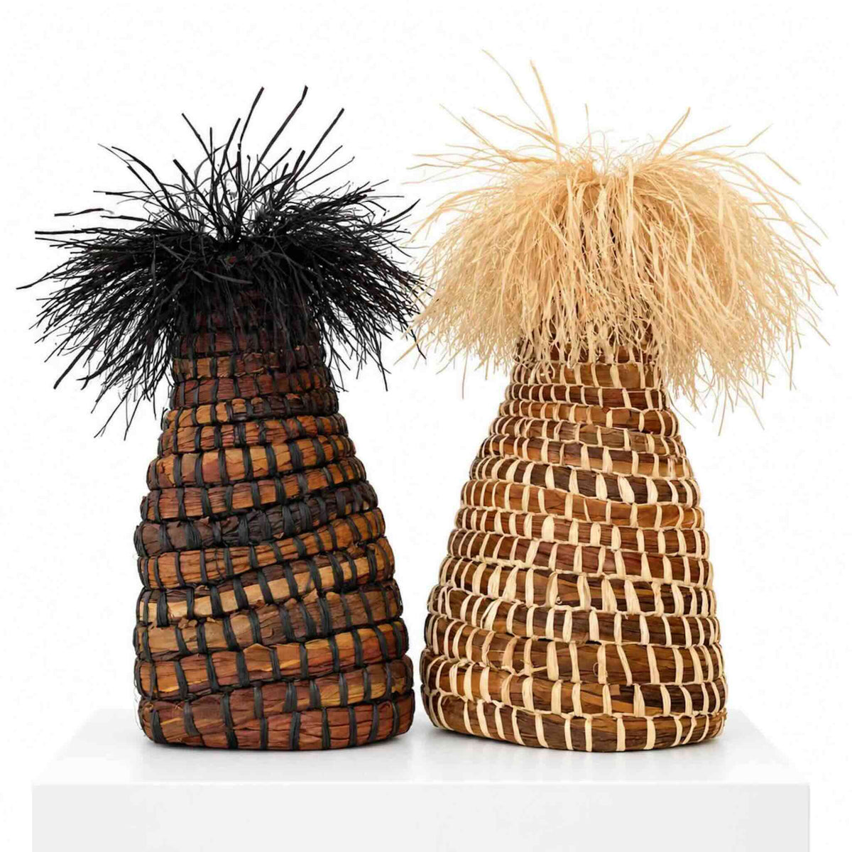 Two of Louise Nades organic woven forms using Raffia from Ora Fabulous Fibres