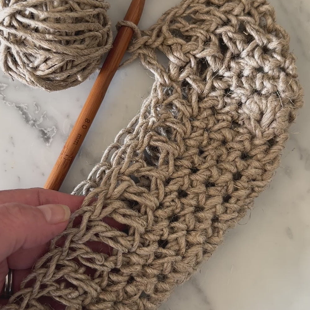 
                  
                    Load and play video in Gallery viewer, feeling the rustic natural linen yarn that is being crocheted into a bag
                  
                