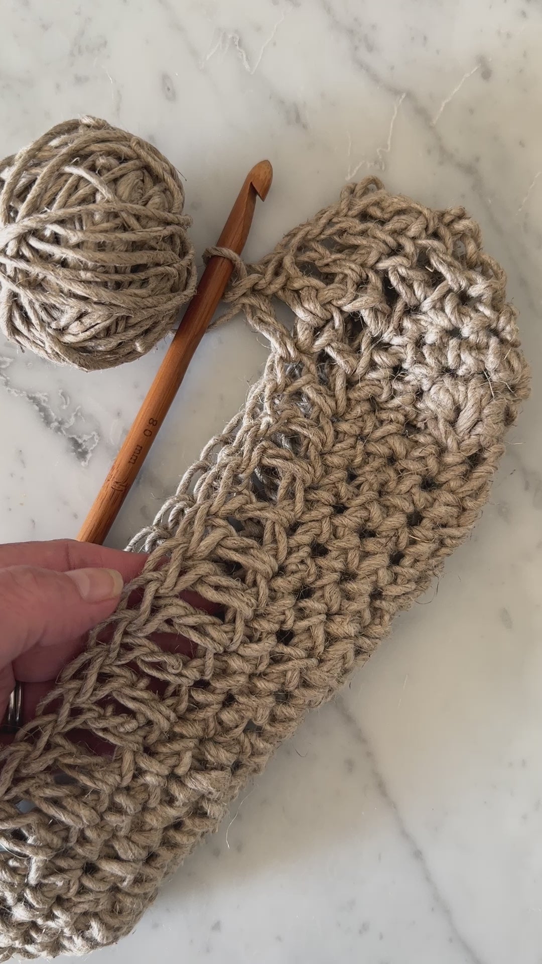 
                  
                    Load and play video in Gallery viewer, feeling the rustic natural linen yarn that is being crocheted into a bag
                  
                