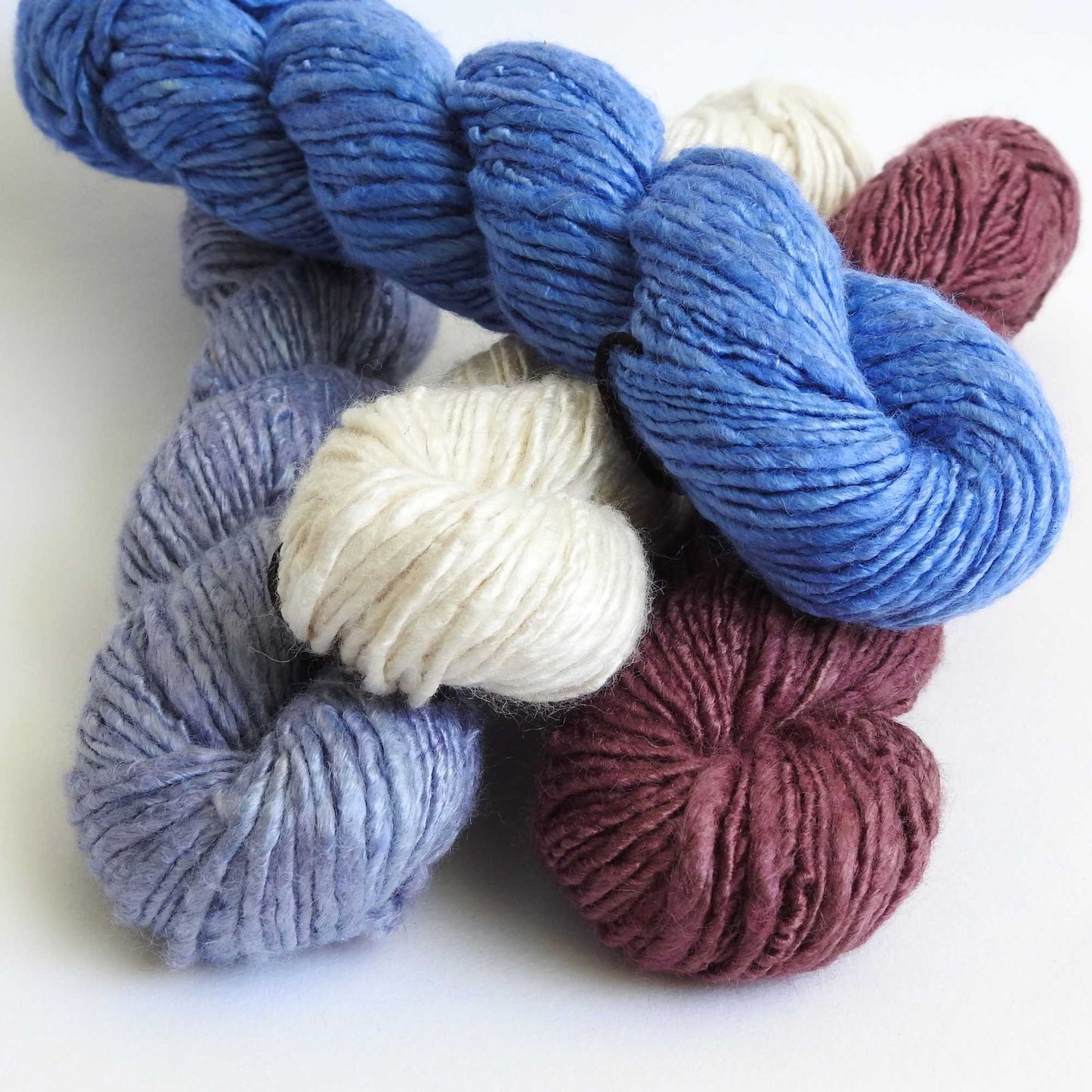 bunch of bamboo yarn skeins. a vegan yarn which is ideal for knitting, weaving, crochet & craft. soft bamboo yarn