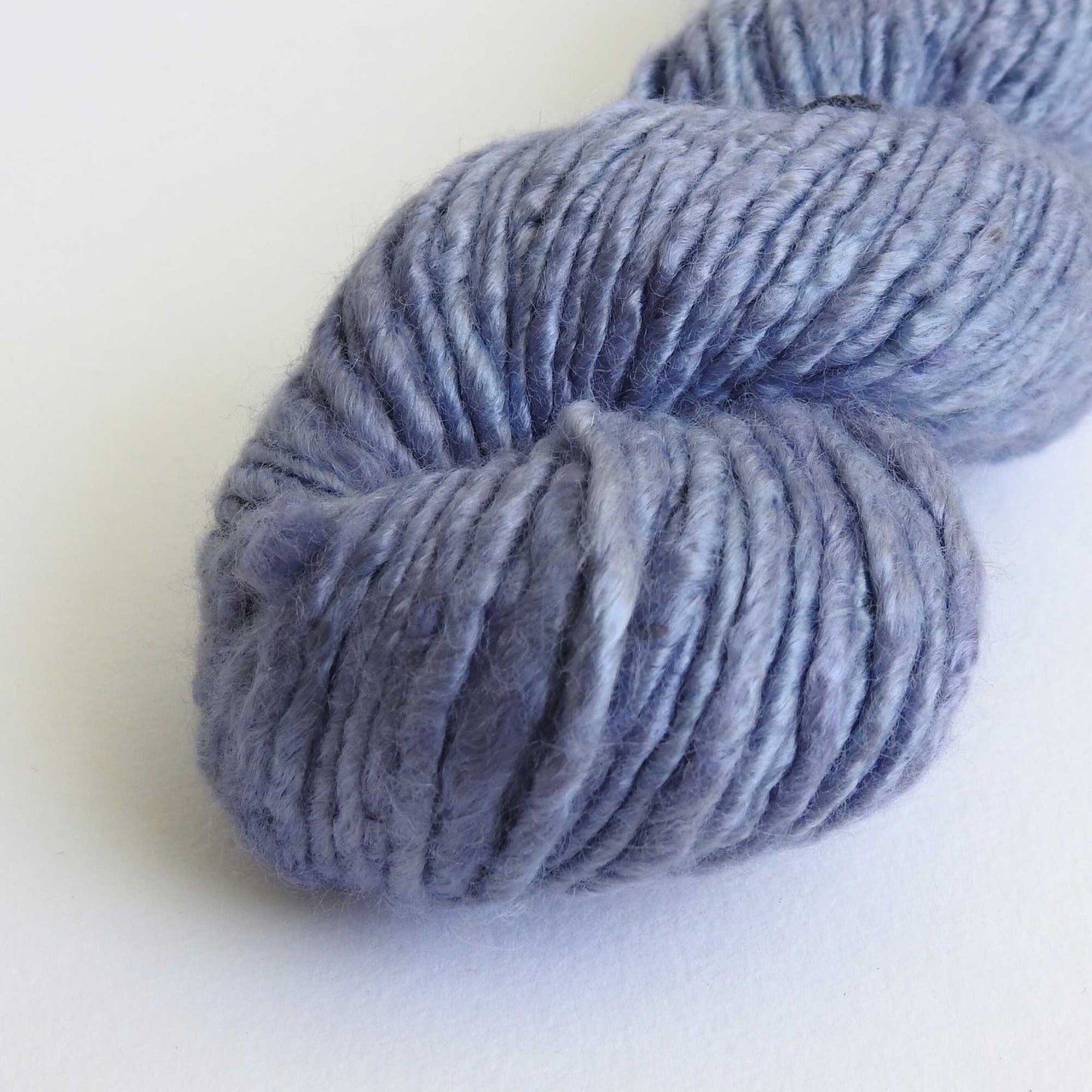 
                  
                    a skein of bamboo yarn in steel blue. a vegan yarn which is ideal for knitting, weaving, crochet & craft. soft bamboo yarn
                  
                