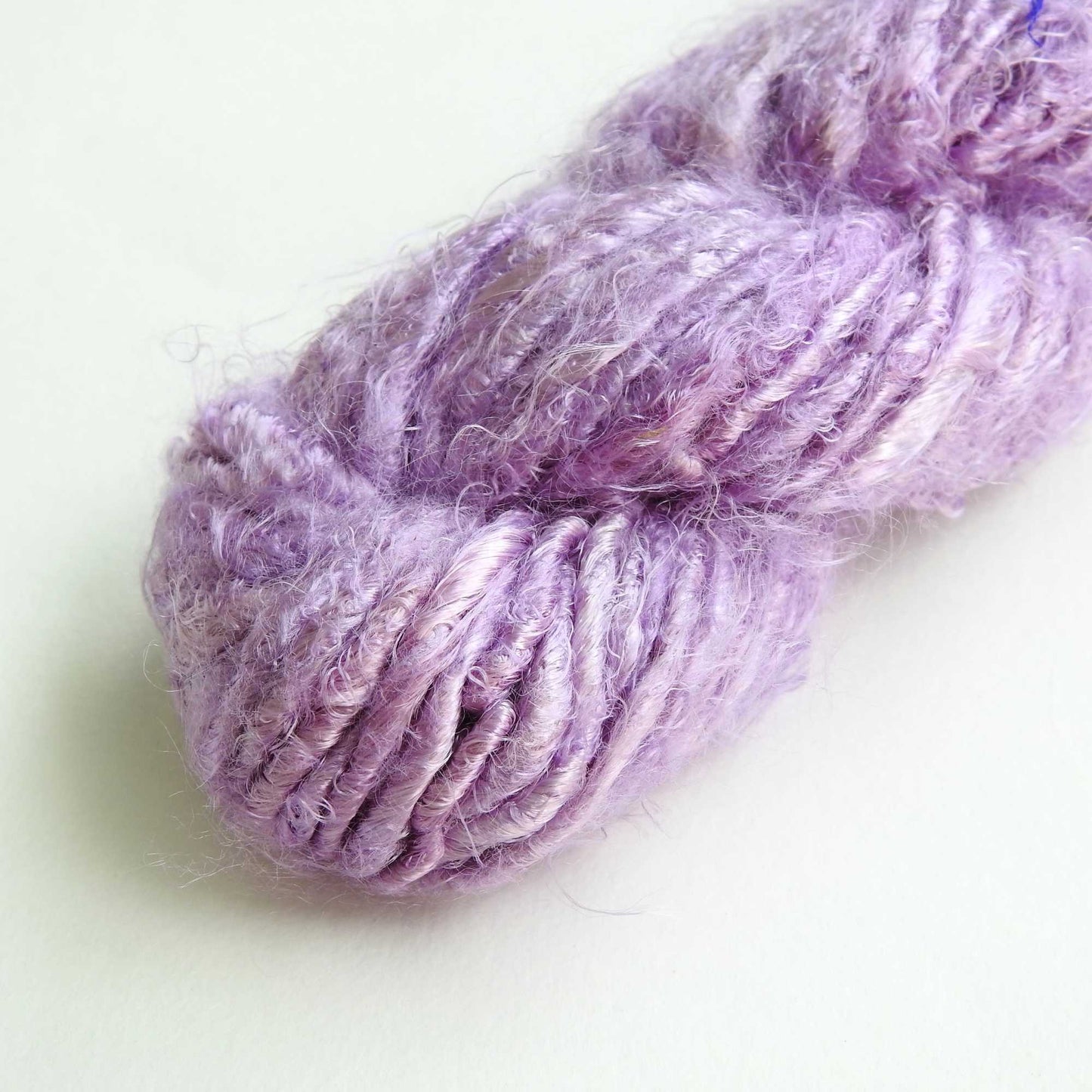 
                  
                    A ball of Banana Silk Yarn in Lavender. Natural, vegan banana fiber yarn for weaving, punch needle, knitting, crochet. Soft, squishy, chunky yarn.
                  
                