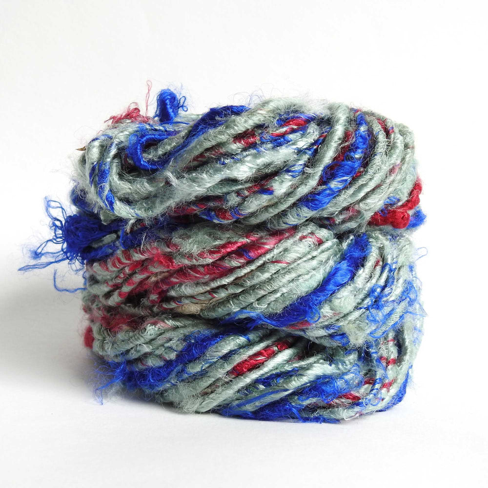 
                  
                    A ball of Banana Silk Yarn in Regatta. Natural, vegan banana fiber yarn for weaving, punch needle, knitting, crochet. Soft, squishy, chunky yarn.
                  
                