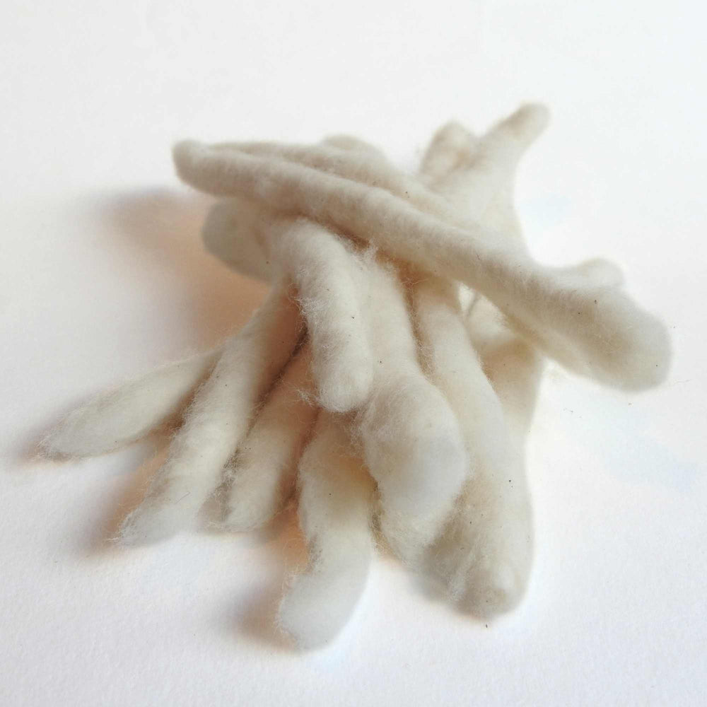 
                  
                    bundle of handspun cotton rolls (cotton poonies).  perfect for fibre artists, textile artists, spinning. can be dyed. traditionally known as cotton poonies.
                  
                