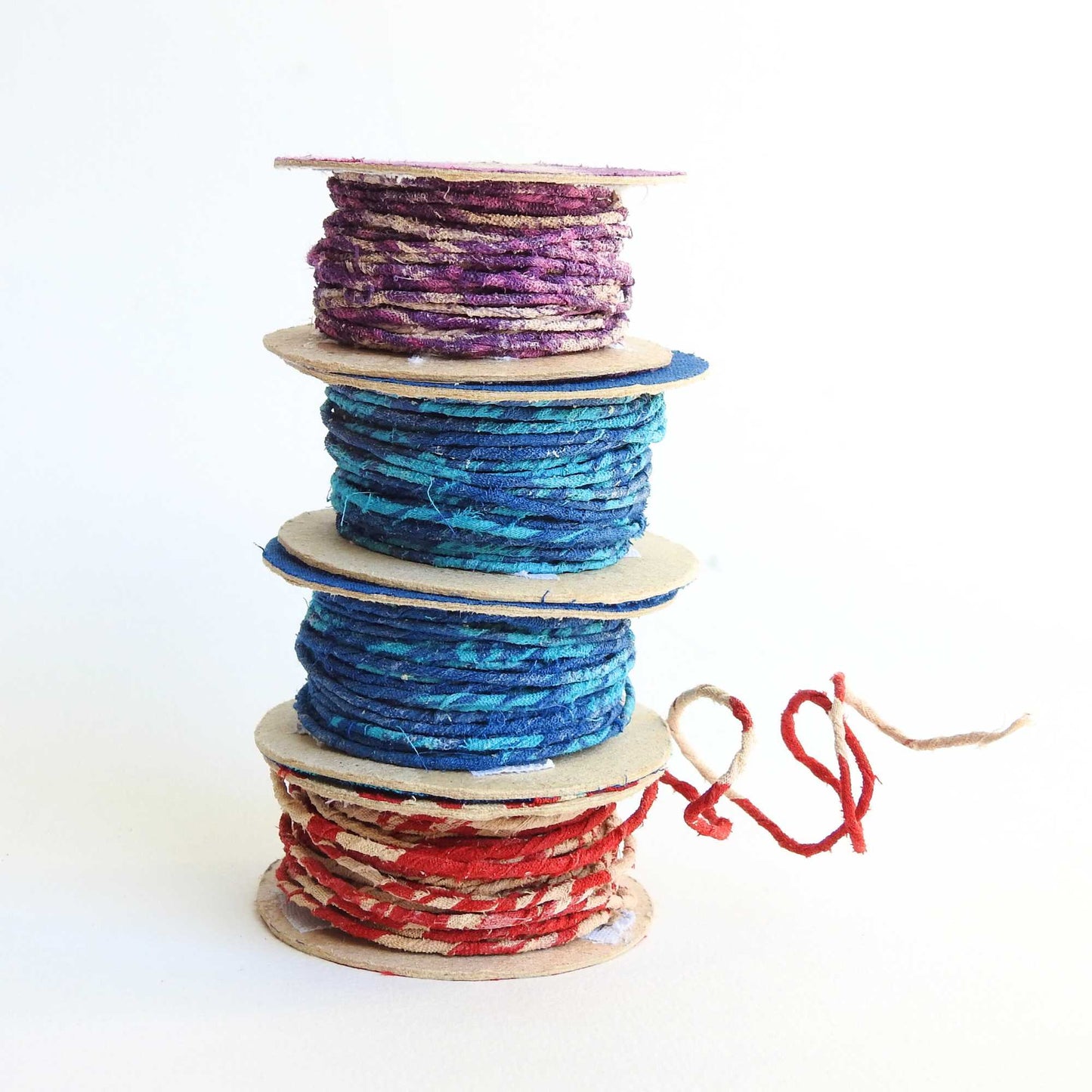 
                  
                    Reels of fairtrade craft wire for beading, craft, amigumuri, flowers, headbands, jewelry. Cloth covered flexible wire. Handmade using upcycled cotton saris. 
                  
                