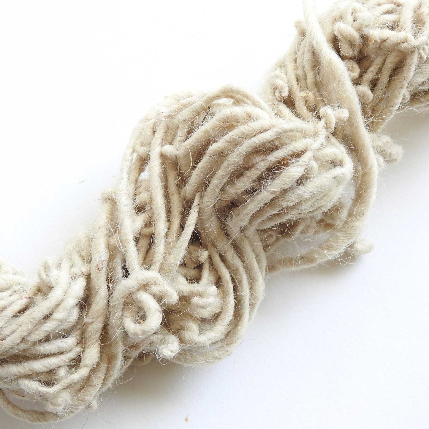 
                  
                    Chunky Felted wool yarn with over spin for texture. Lightly felted. Natural New Zealand wool. Use for weaving, macrame, baskets, hats. textile arts, dyeing.
                  
                