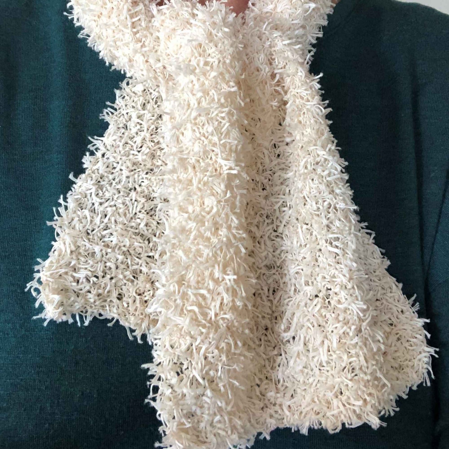 
                  
                    lady wearing knitted scarf around her neck. Scarf is knitted using Habu Textiles Cotton Cork Chenille yarn which is soft and fluffy
                  
                