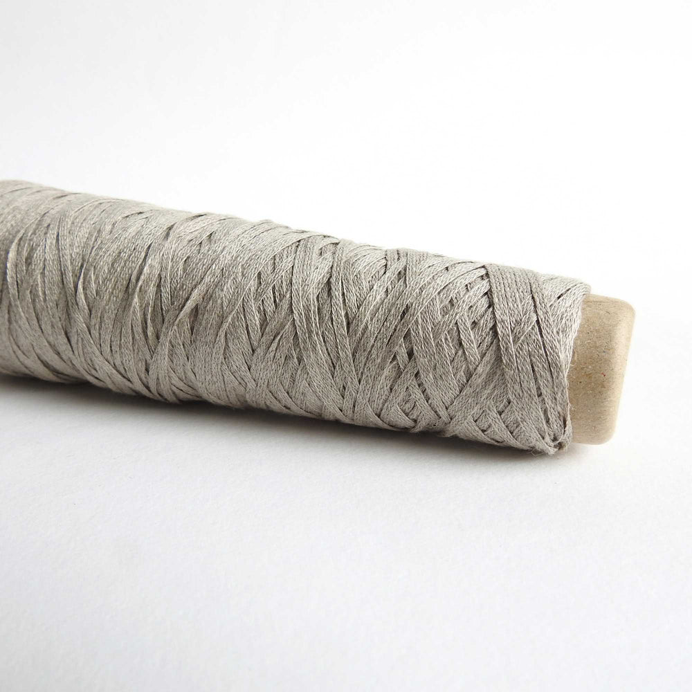 
                      
                        Habu Textiles Knitted Linen Tape in Natural. Pure Linen tape for knitting, crochet and weaving. Strong, natural, vegan yarn. Habu Textiles N-98
                      
                    