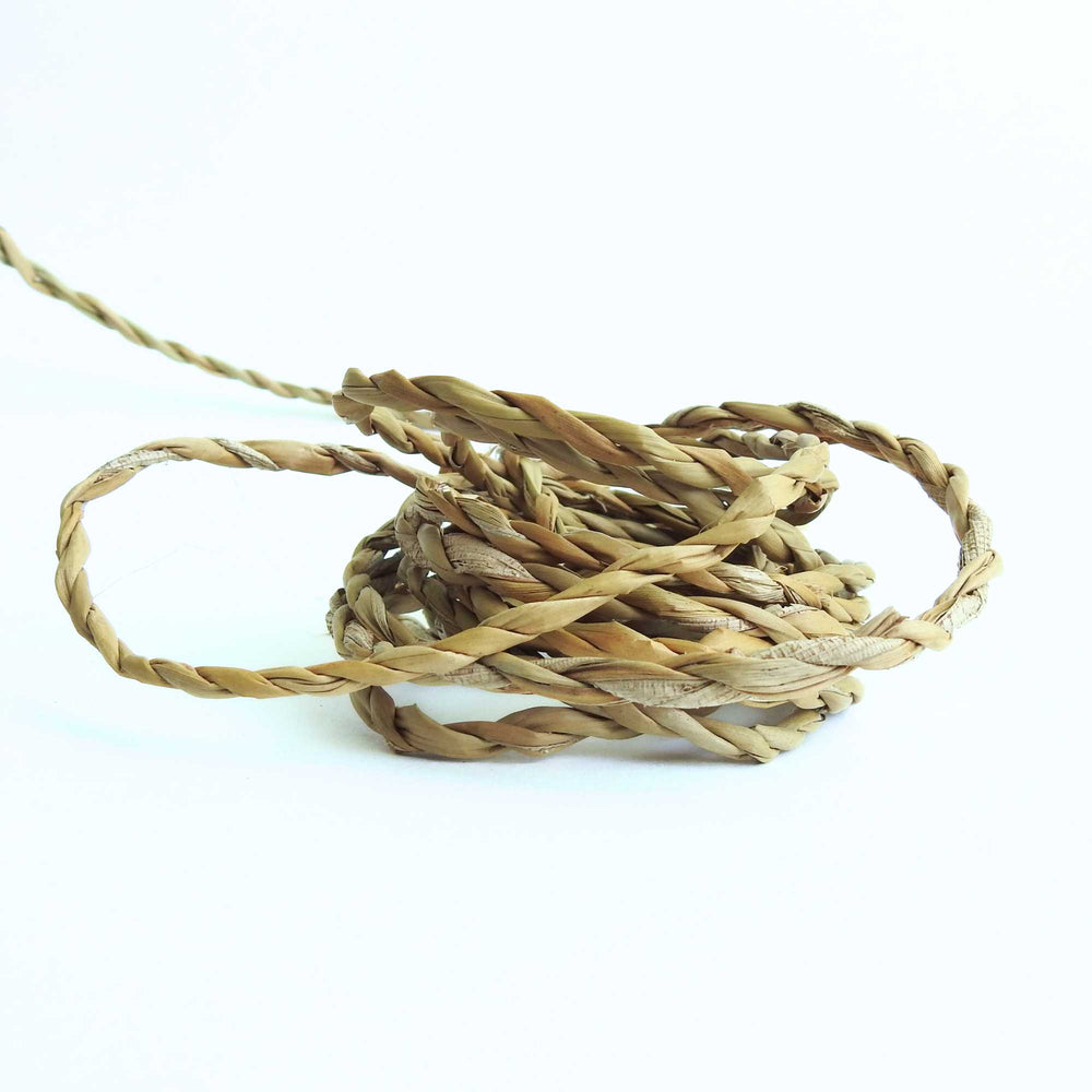 
                      
                        ball of hogla cord, a natural grass harvested and hand produced in bangladesh. sustainably grown. very strong and durable cord
                      
                    