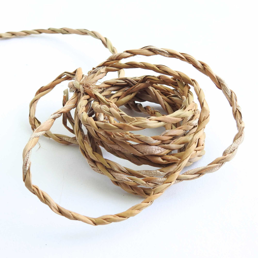 
                      
                        ball of hogla cord, a natural grass harvested and hand produced in bangladesh. sustainably grown. very strong and durable cord
                      
                    