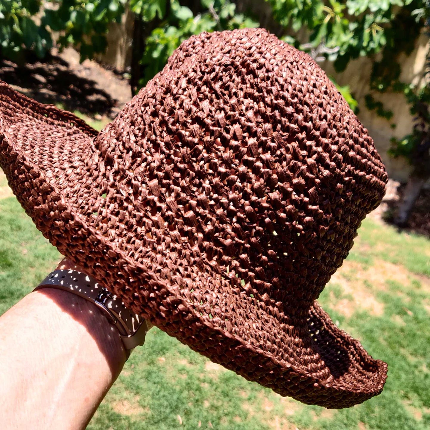 
                  
                    crocheted sun hat made by Anita. Crocheted using Daruma Paper Raffia in Dark Brown
                  
                