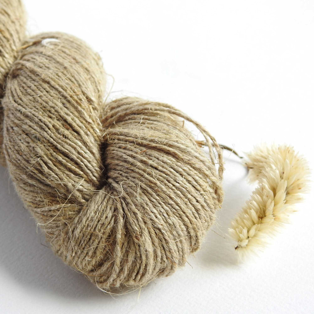 skein of unbleached natural linen yarn for weaving, knitting, crochet. sustainable eco friendly