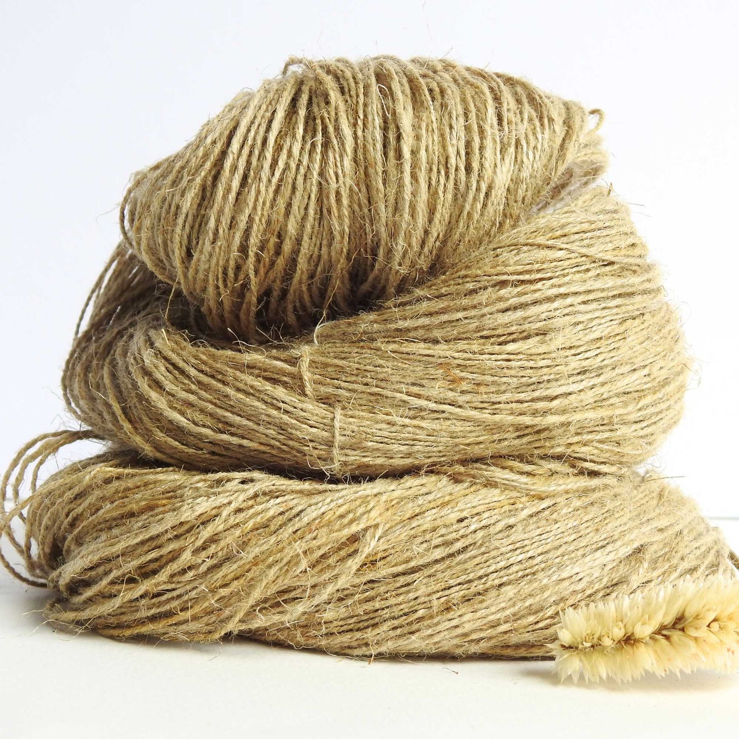 
                  
                    skein of unbleached natural linen yarn for weaving, knitting, crochet. sustainable eco friendly
                  
                