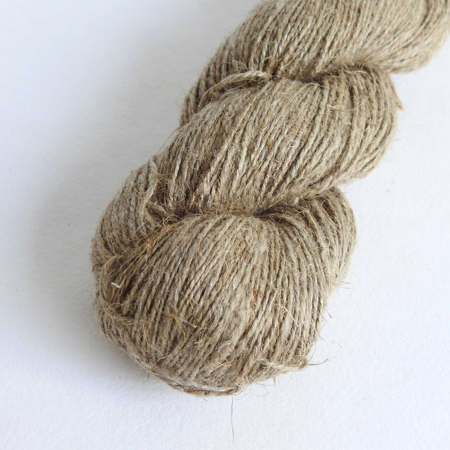 skein of unbleached natural linen yarn for weaving, knitting, crochet. sustainable eco friendly