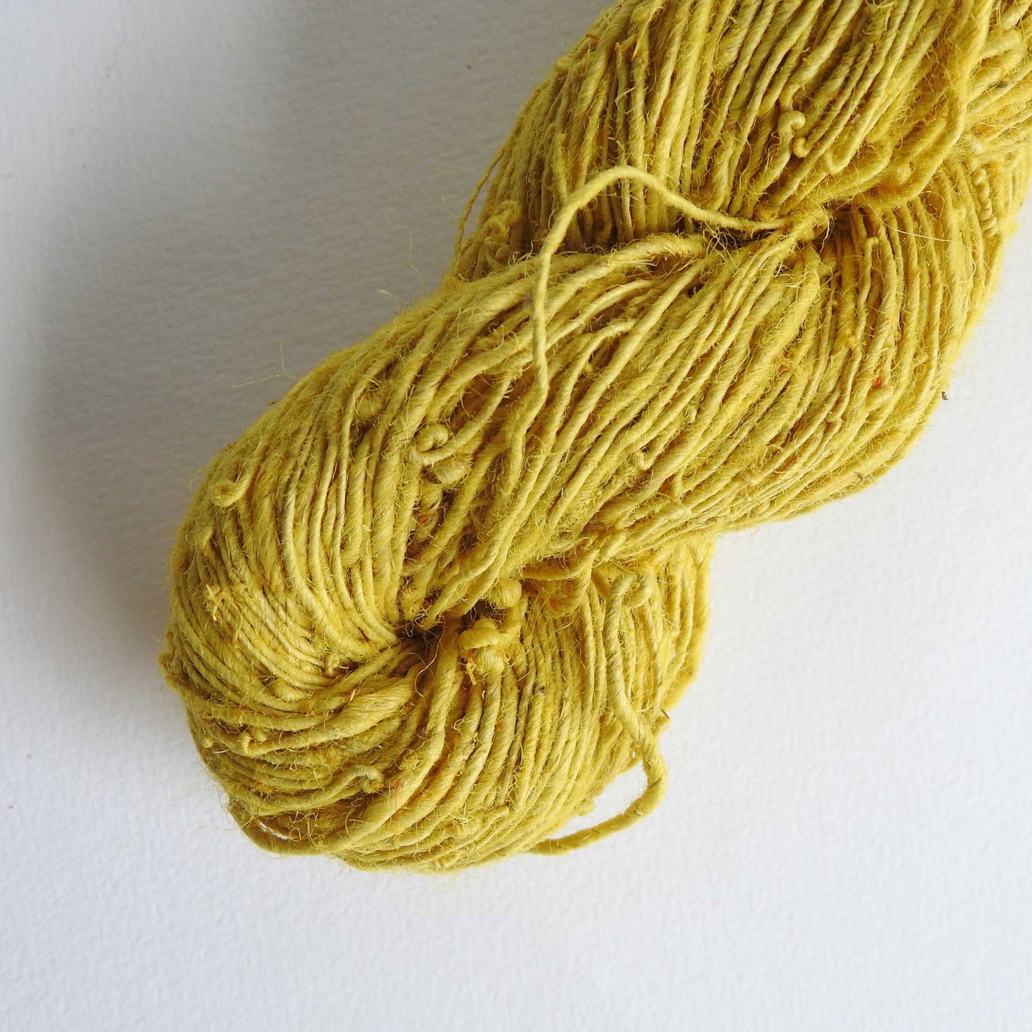 
                  
                    A skein of Nettle yarn in Dandelion. Nettle is a highly sustainable and eco friendly crop. ORA Fabulous Fibres Nettle yarn is hand spun with a beautiful thick and thin texture giving it a rustic finish. Nettle yarn is available in a range of colours.
                  
                