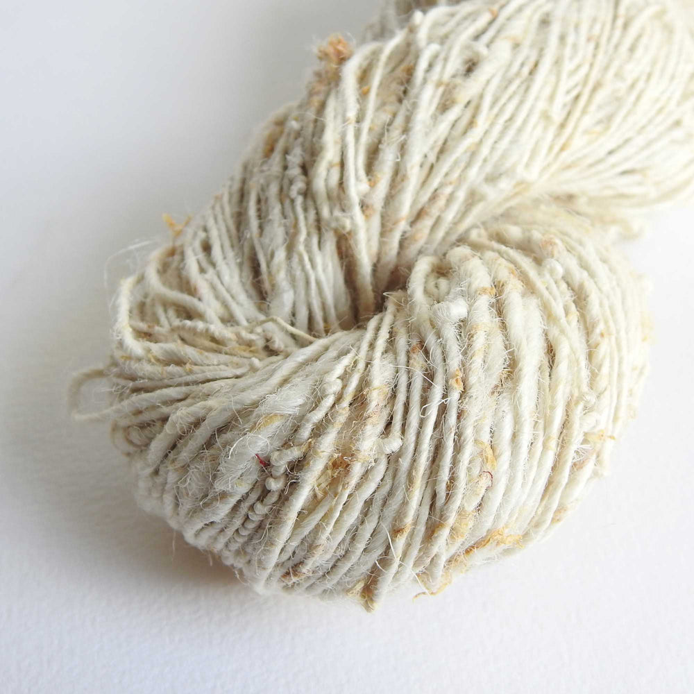 
                  
                    A skein of Nettle yarn in Parchment. Nettle is a highly sustainable and eco friendly crop. ORA Fabulous Fibres Nettle yarn is hand spun with a beautiful thick and thin texture giving it a rustic finish. Nettle yarn is available in a range of colours.
                  
                
