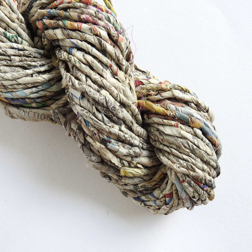 skein of recycled newspaper yarn. hand crafted and sustainable. paper yarn for craft, weaving, crochet, knit, gift wrapping