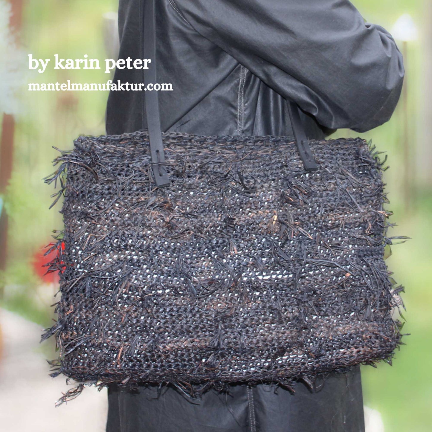 
                  
                    raffia bag hand crocheted by karin peter using colour liquorice. hand made. one of a kind. easy crochet with nutscene raffia
                  
                