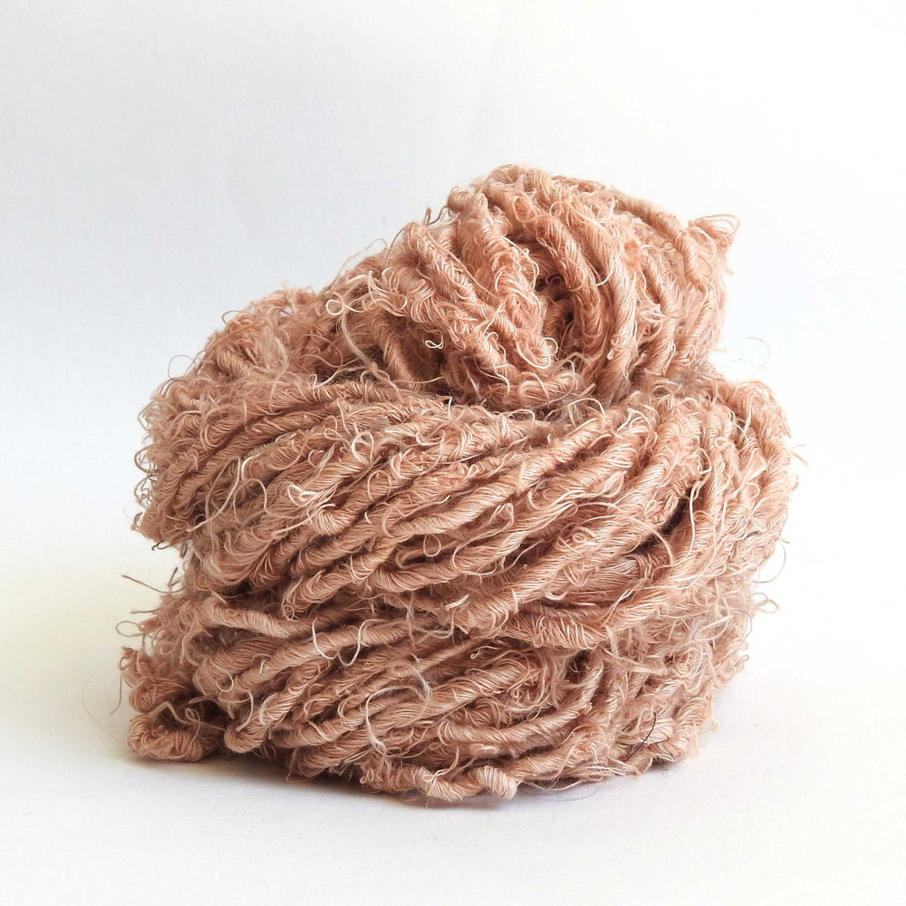 
                  
                    Ball of chunky yarn in Sand. A thick yarn hand crafted from recycled linen material. A recycled yarn for blankets, macrame, scarves, hats, bags. Sustainable eco friendly vegan yarn. Sustainable yarn australia.
                  
                