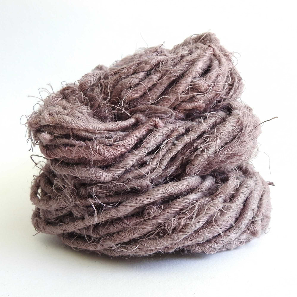 
                      
                        Ball of chunky yarn in Dusty Purple. A thick yarn hand crafted from recycled linen material. A recycled yarn for blankets, macrame, scarves, hats, bags. Sustainable eco friendly vegan yarn. Sustainable yarn australia.
                      
                    