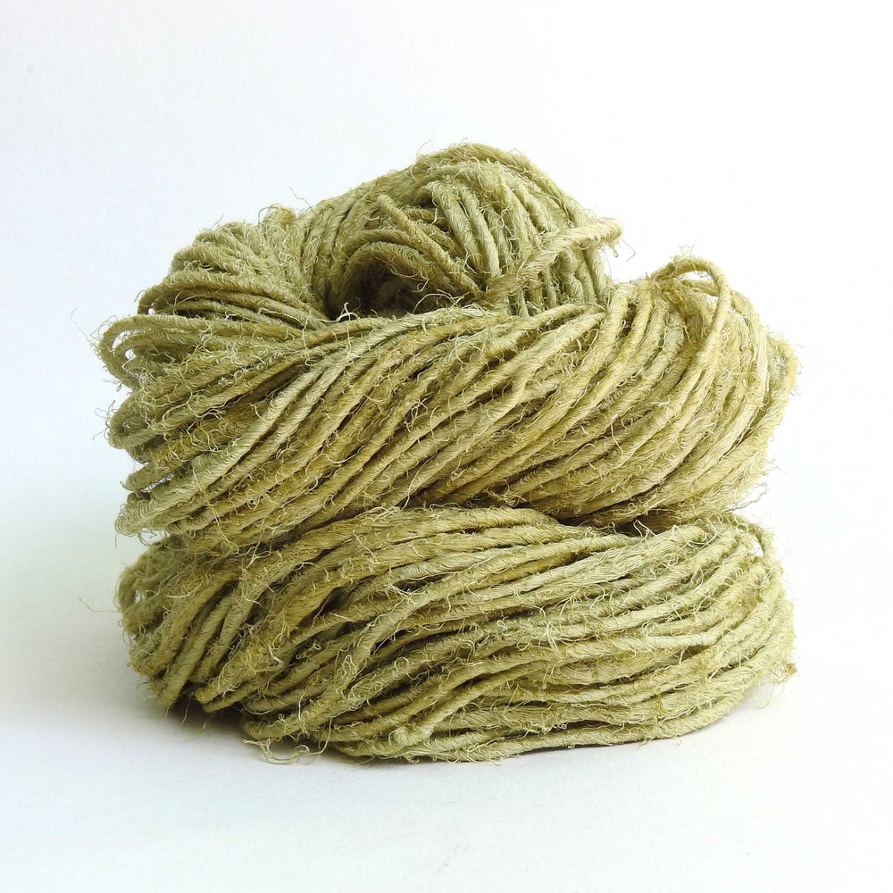 Ball of chunky yarn in Pepperstem. A thick yarn hand crafted from recycled linen material. A recycled yarn for blankets, macrame, scarves, hats, bags. Sustainable eco friendly vegan yarn. Sustainable yarn australia.