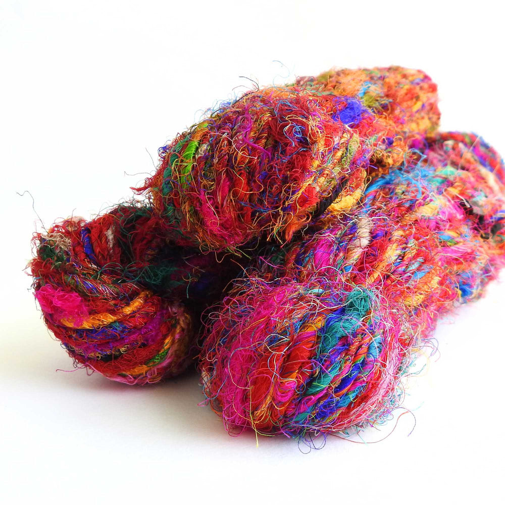 
                      
                        Ball of Sari Silk Yarn in Fiesta. Recycled sari silk yarn Australia. Eco friendly yarn. Handspun, chunky yarn for knitting, crochet, weaving, craft.
                      
                    