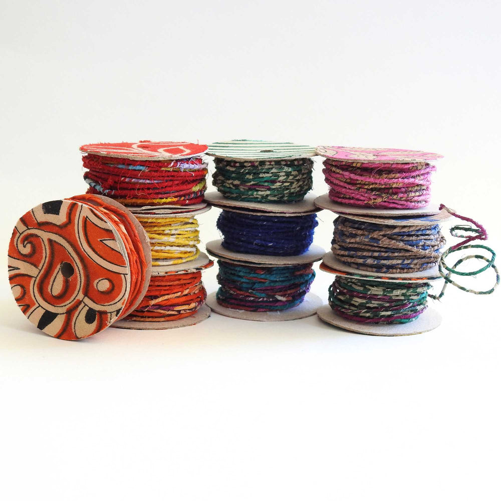 
                      
                        Reels of fairtrade craft wire for beading, craft, amigumuri, flowers, headbands, jewelry. Cloth covered flexible wire. Handmade using upcycled cotton saris. 
                      
                    