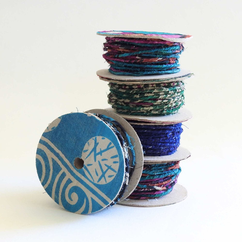 
                      
                        Reels of fairtrade craft wire for beading, craft, amigumuri, flowers, headbands, jewelry. Cloth covered flexible wire. Handmade using upcycled cotton saris. 
                      
                    