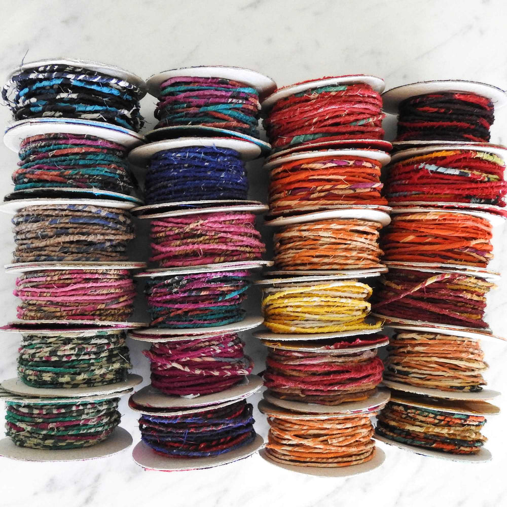 
                      
                        Reels of fairtrade craft wire for beading, craft, amigumuri, flowers, headbands, jewelry. Cloth covered flexible wire. Handmade using upcycled cotton saris. 
                      
                    