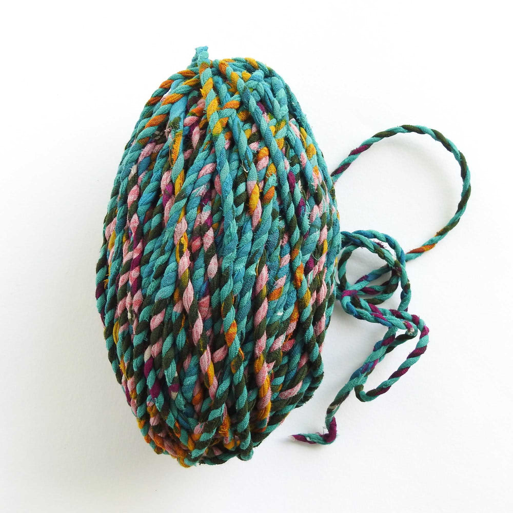 large ball of upcycled sari cord for craft, weaving, knitting, crochet. assorted colorful cotton cord. eco friendly