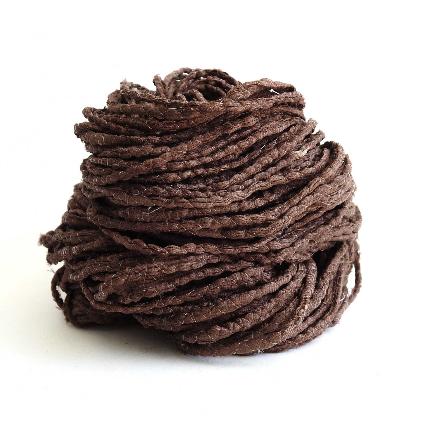 skein of upcycled sari cord in chocolate. a matt silk cord, hand twisted and ideal for crafting hats, bags etc. 