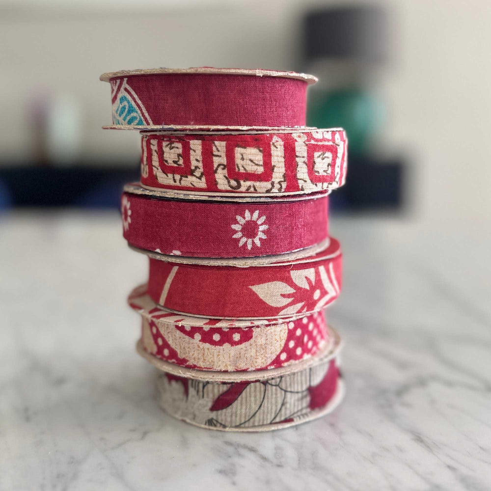 
                      
                        spools of upcycled sari cotton for weaving, baskets, trim, hair, hats, bags. Assorted colours and patterns. Crafted from upcycled sari cotton.
                      
                    