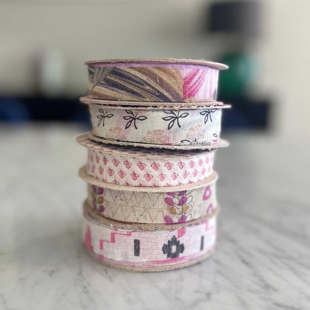 
                      
                        spools of upcycled sari cotton for weaving, baskets, trim, hair, hats, bags. Assorted colours and patterns. Crafted from upcycled sari cotton.
                      
                    