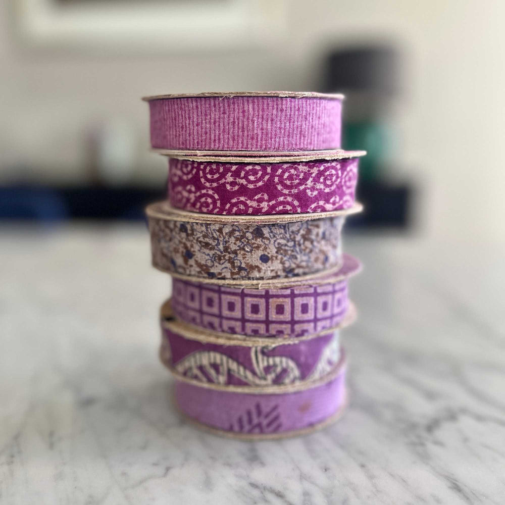 
                      
                        spools of upcycled sari cotton for weaving, baskets, trim, hair, hats, bags. Assorted colours and patterns. Crafted from upcycled sari cotton.
                      
                    