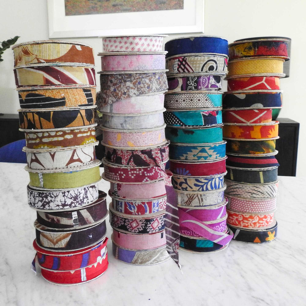 
                      
                        spools of upcycled sari cotton for weaving, baskets, trim, hair, hats, bags. Assorted colours and patterns. Crafted from upcycled sari cotton.
                      
                    