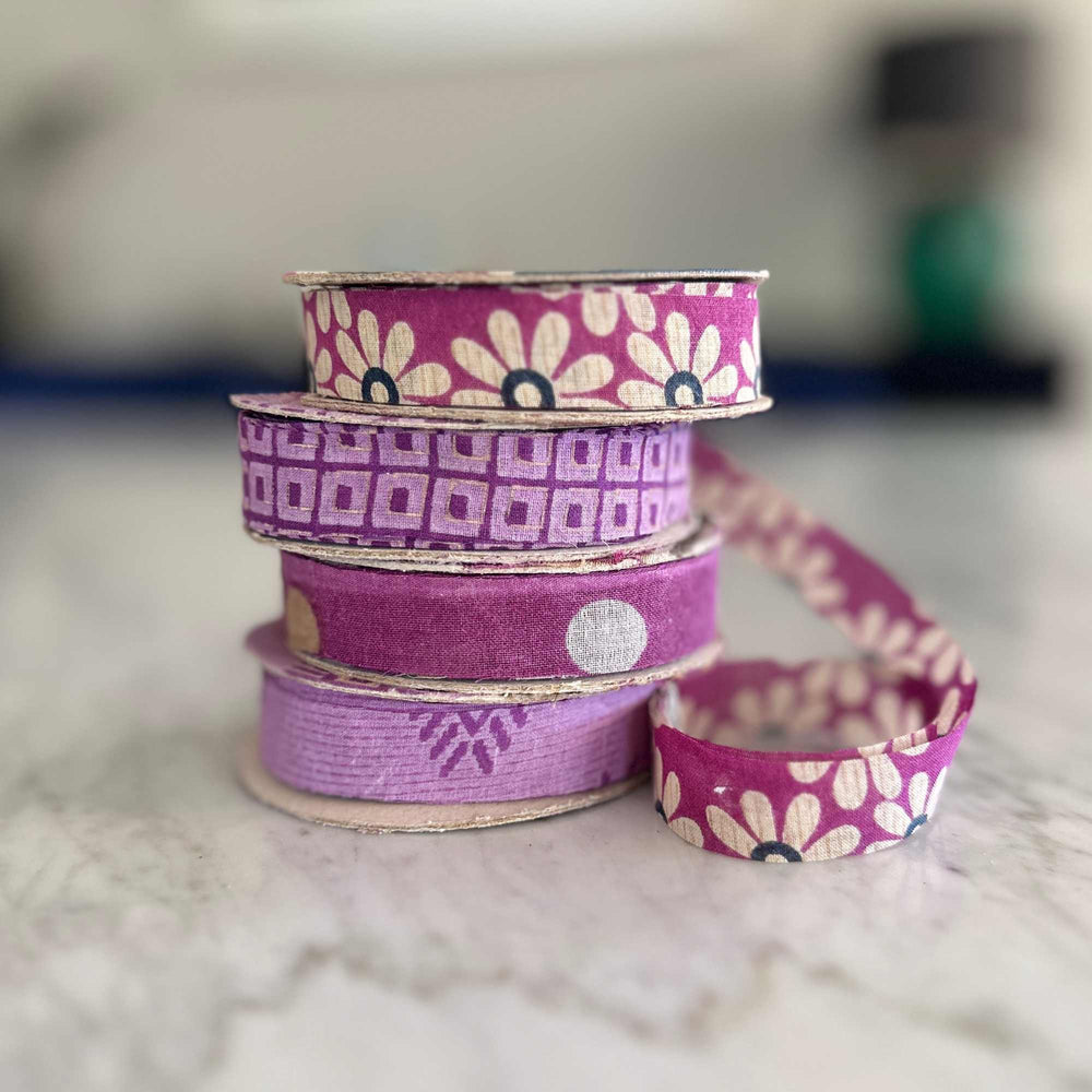 
                      
                        spools of upcycled sari cotton ribbon for weaving, baskets, trim, hair, hats, bags. Assorted colours and patterns. Crafted from upcycled sari cotton.
                      
                    