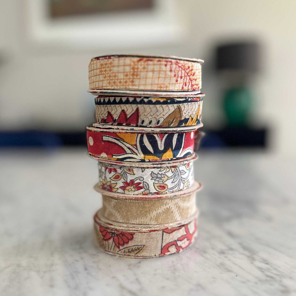 
                      
                        spools of upcycled sari cotton ribbon for weaving, baskets, trim, hair, hats, bags. Assorted colours and patterns. Crafted from upcycled sari cotton.
                      
                    