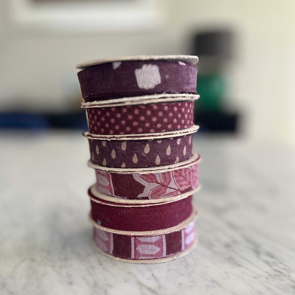 
                      
                        spools of upcycled sari cotton ribbon for weaving, baskets, trim, hair, hats, bags. Assorted colours and patterns. Crafted from upcycled sari cotton.
                      
                    