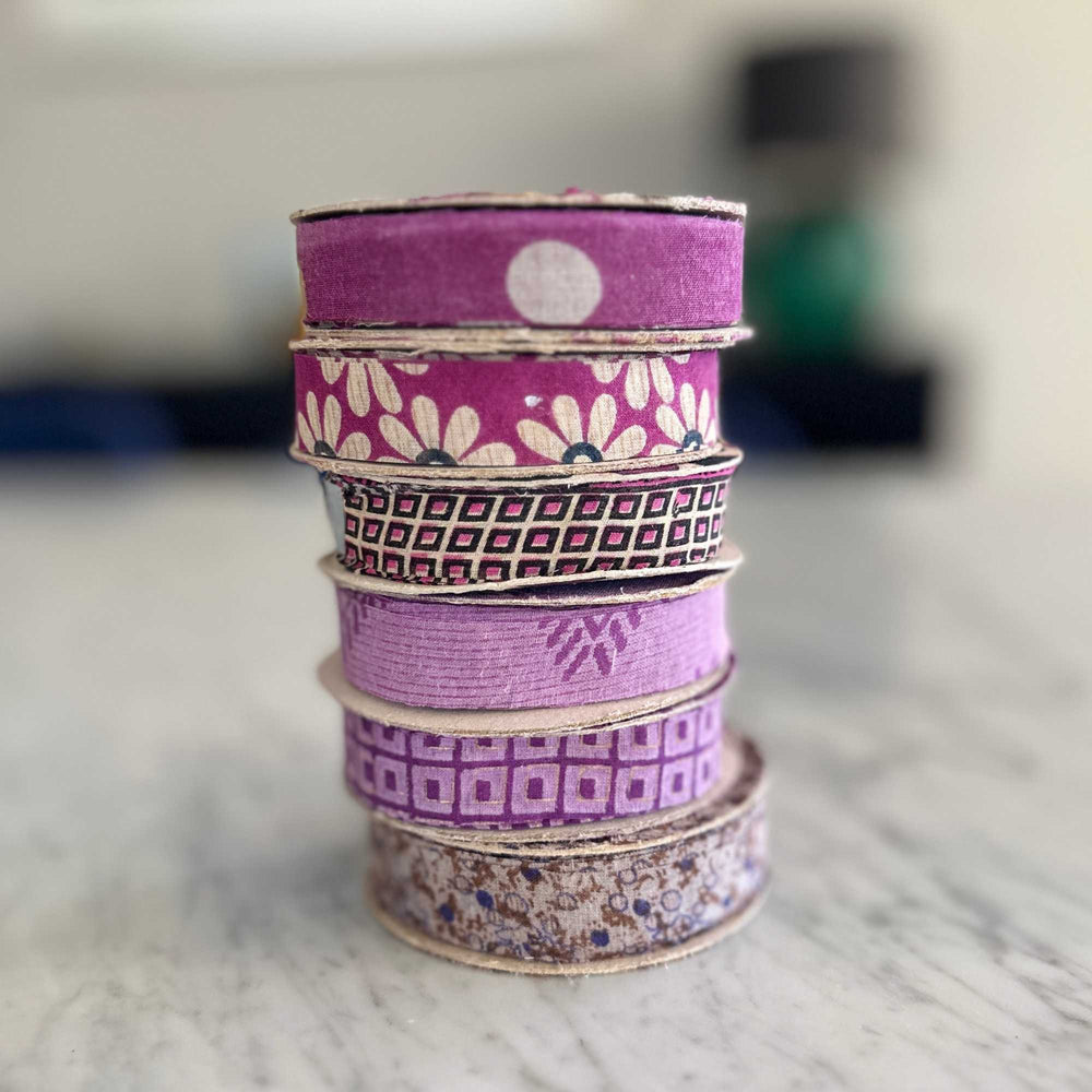 
                      
                        spools of upcycled sari cotton ribbon for weaving, baskets, trim, hair, hats, bags. Assorted colours and patterns. Crafted from upcycled sari cotton.
                      
                    